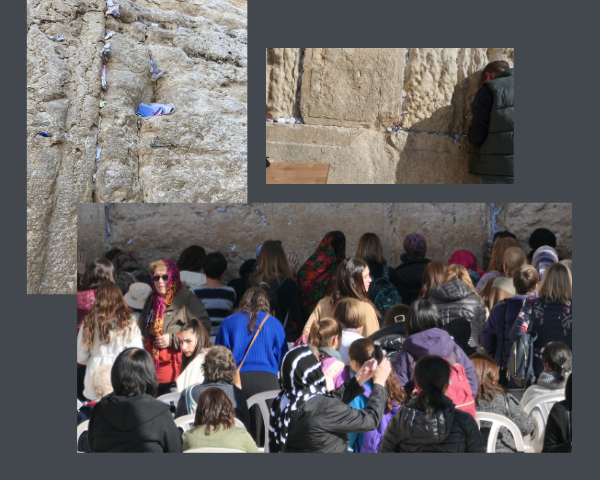 Pilgrims praying at the wailing wall in Jerusalem